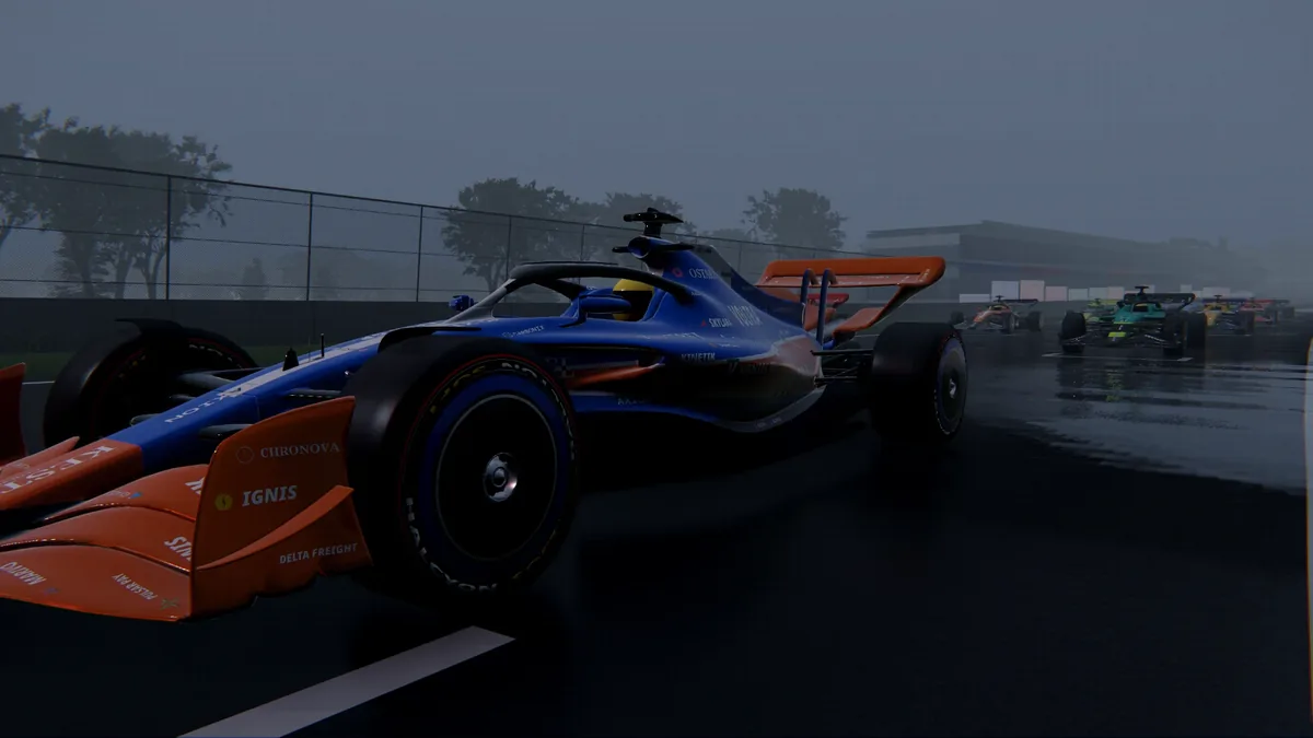 The modern car driving on a wet, overcast track in the rain